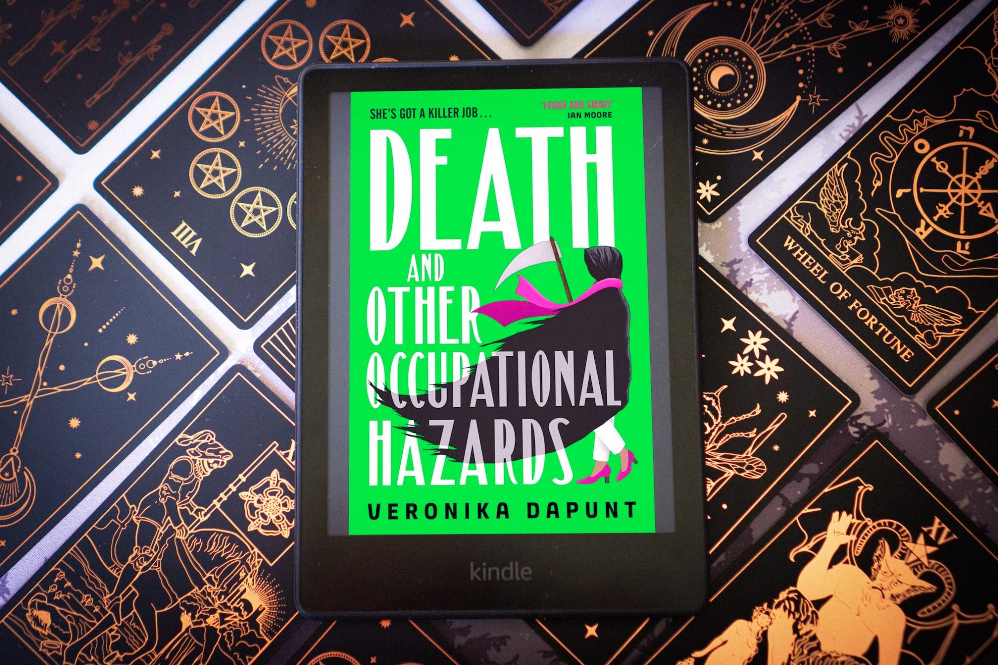 Death Takes a Break to Investigate Some Murders in ‘Death and Other Occupational Hazards’
