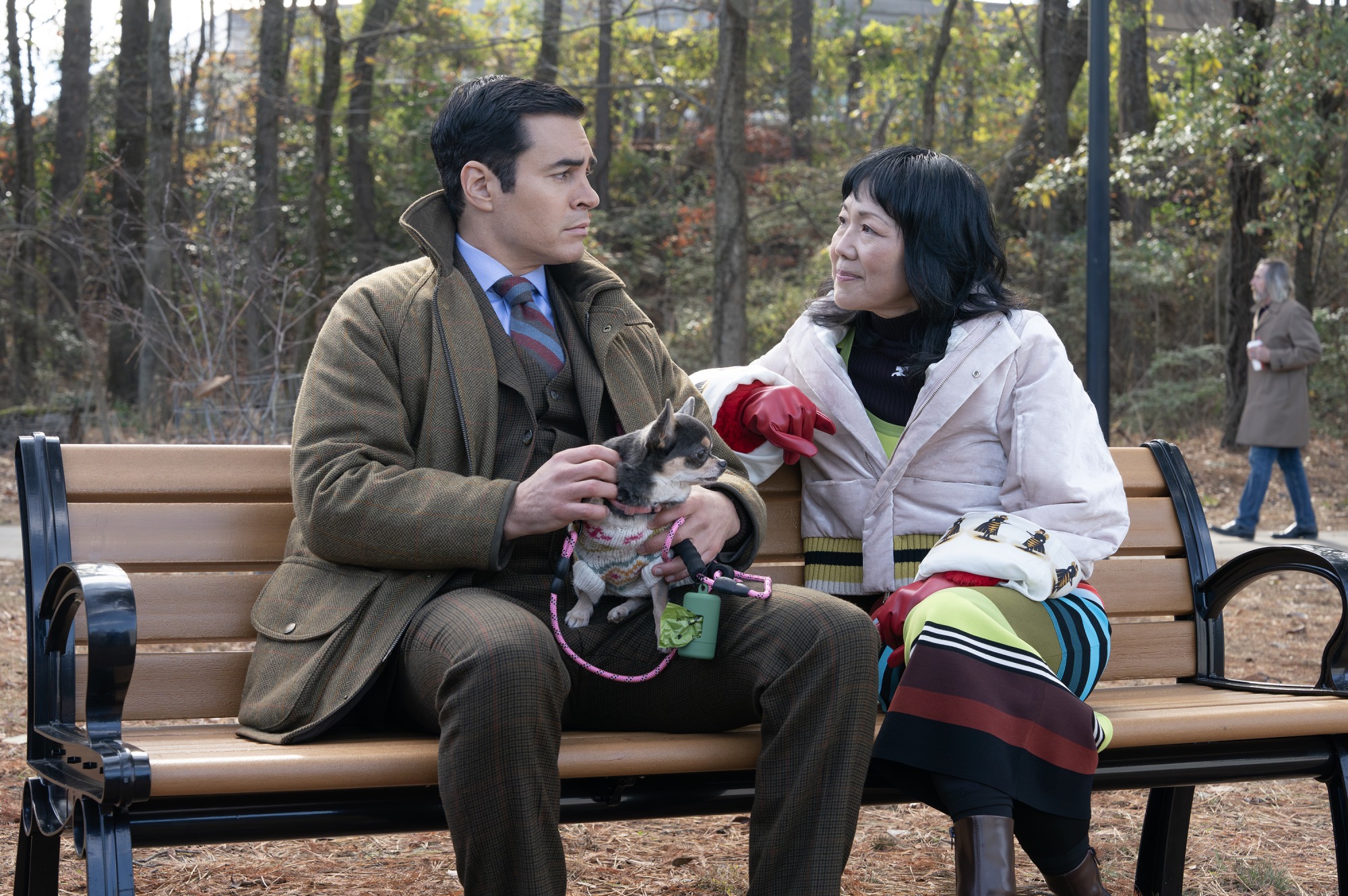 RAMÓN RODRIGUEZ as Will and MARGARET CHO as Dr. Roach sit on a bench for a therapy session in WILL TRENT - “He Lives!” Episode 411